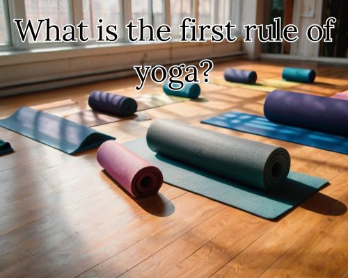 Mats neatly arranged in the yoga studio.