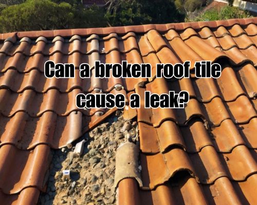 Shattered tiles near roof ridge.